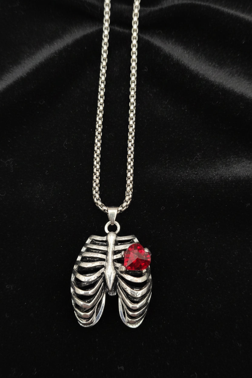 MR. BONES' RIB CAGE/CRYSTAL HEART PENDANT