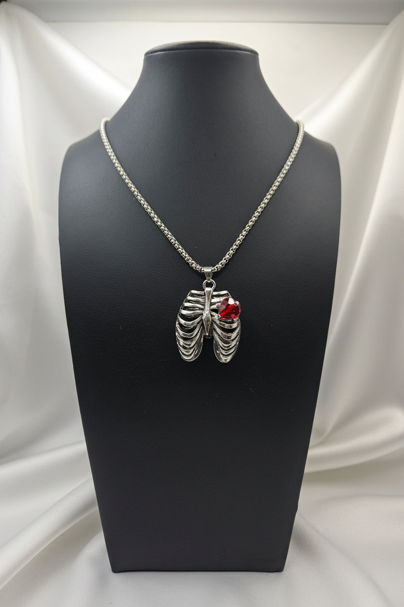 MR. BONES' RIB CAGE/CRYSTAL HEART PENDANT