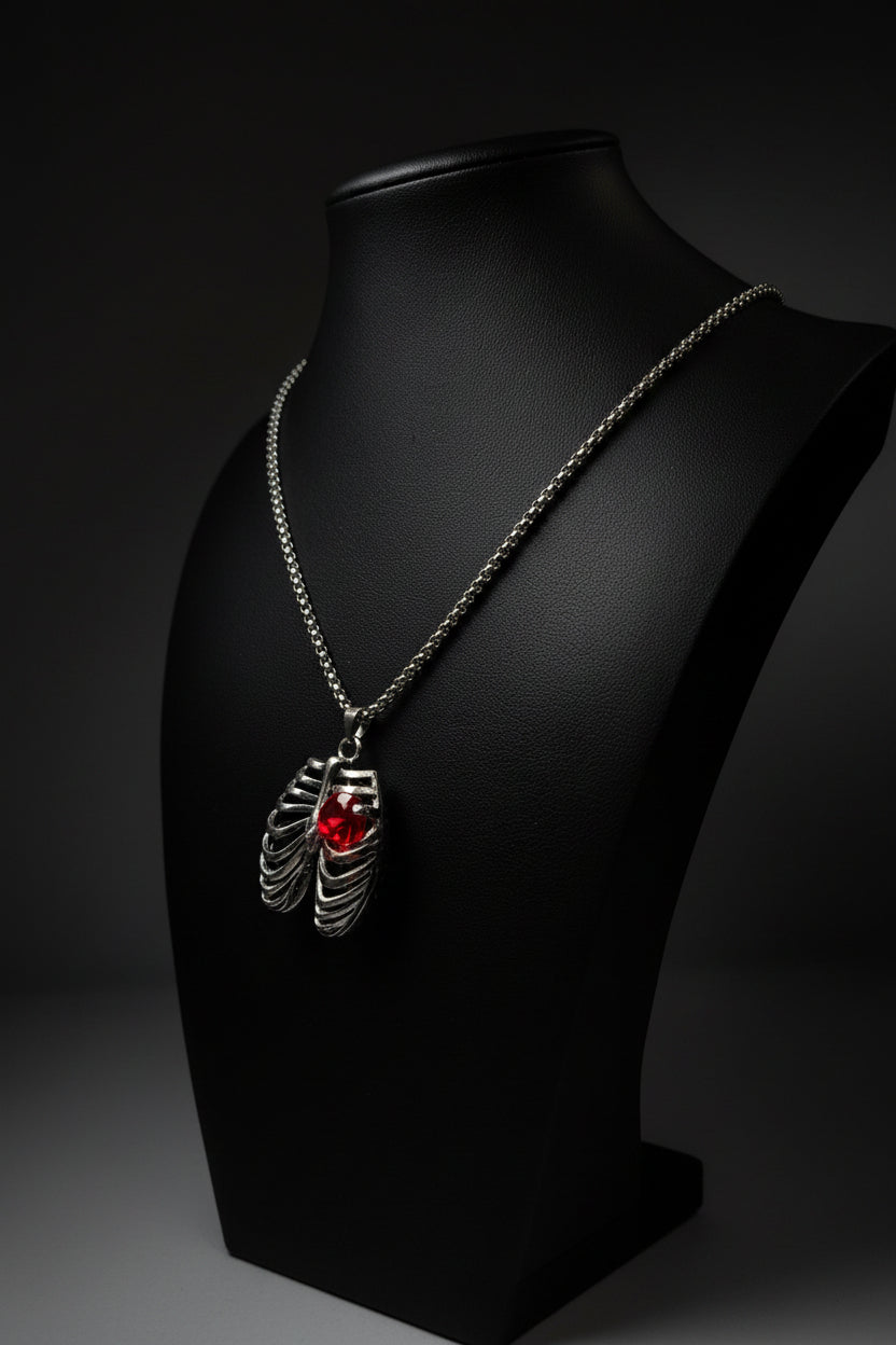 MR. BONES' RIB CAGE/CRYSTAL HEART PENDANT