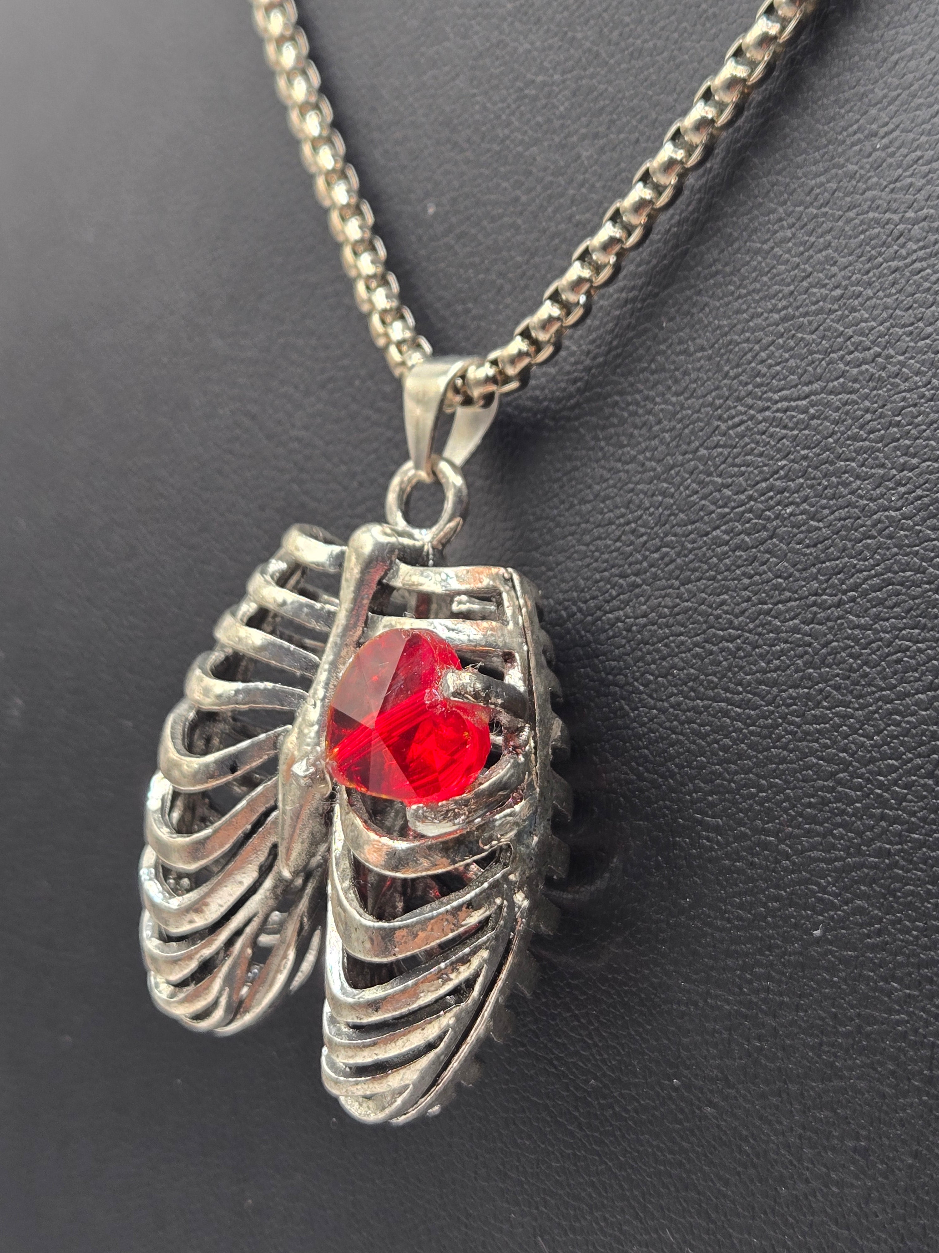 MR. BONES' RIB CAGE/CRYSTAL HEART PENDANT