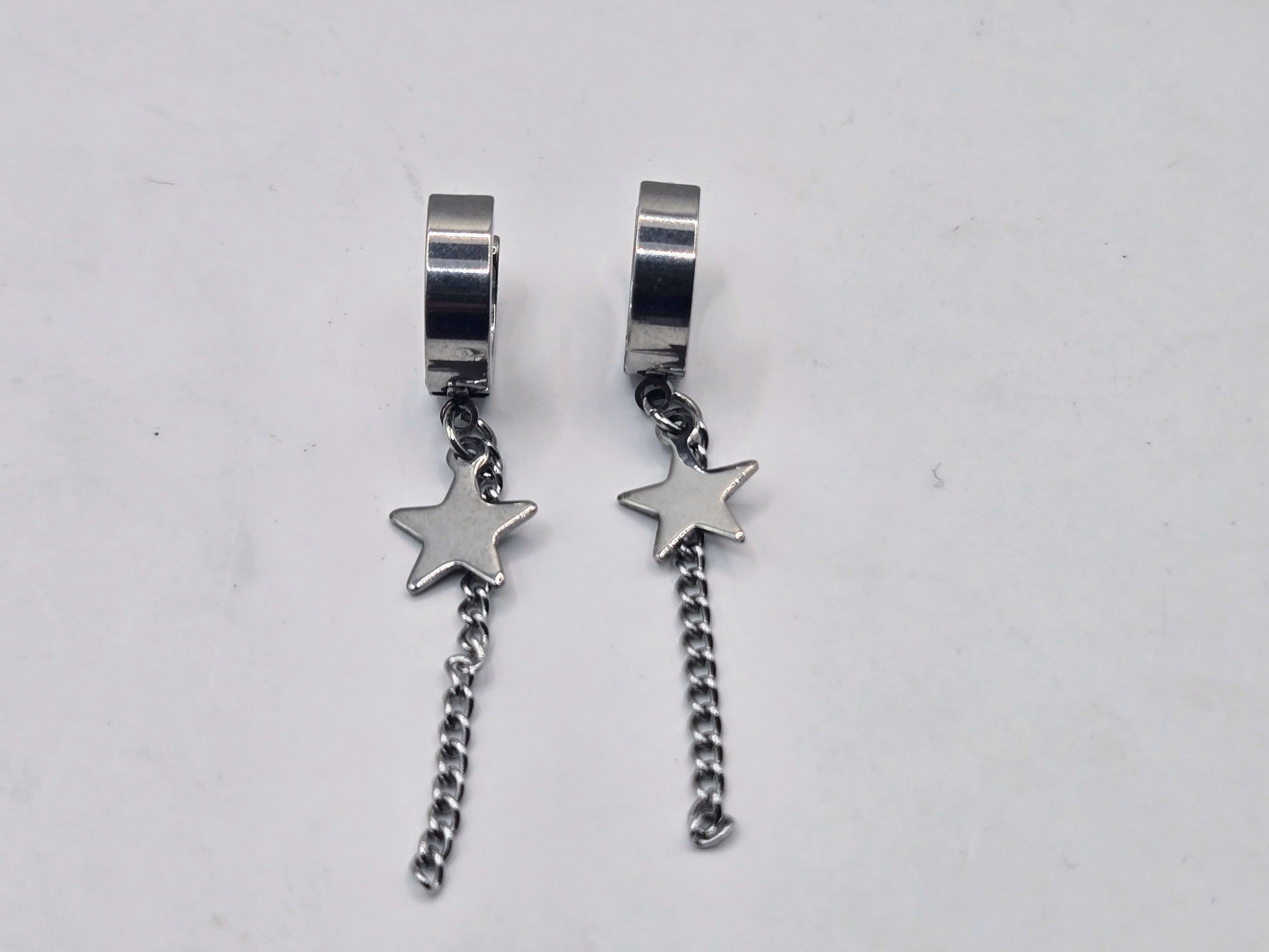 STAR TASSEL HUGGIE EARRINGS