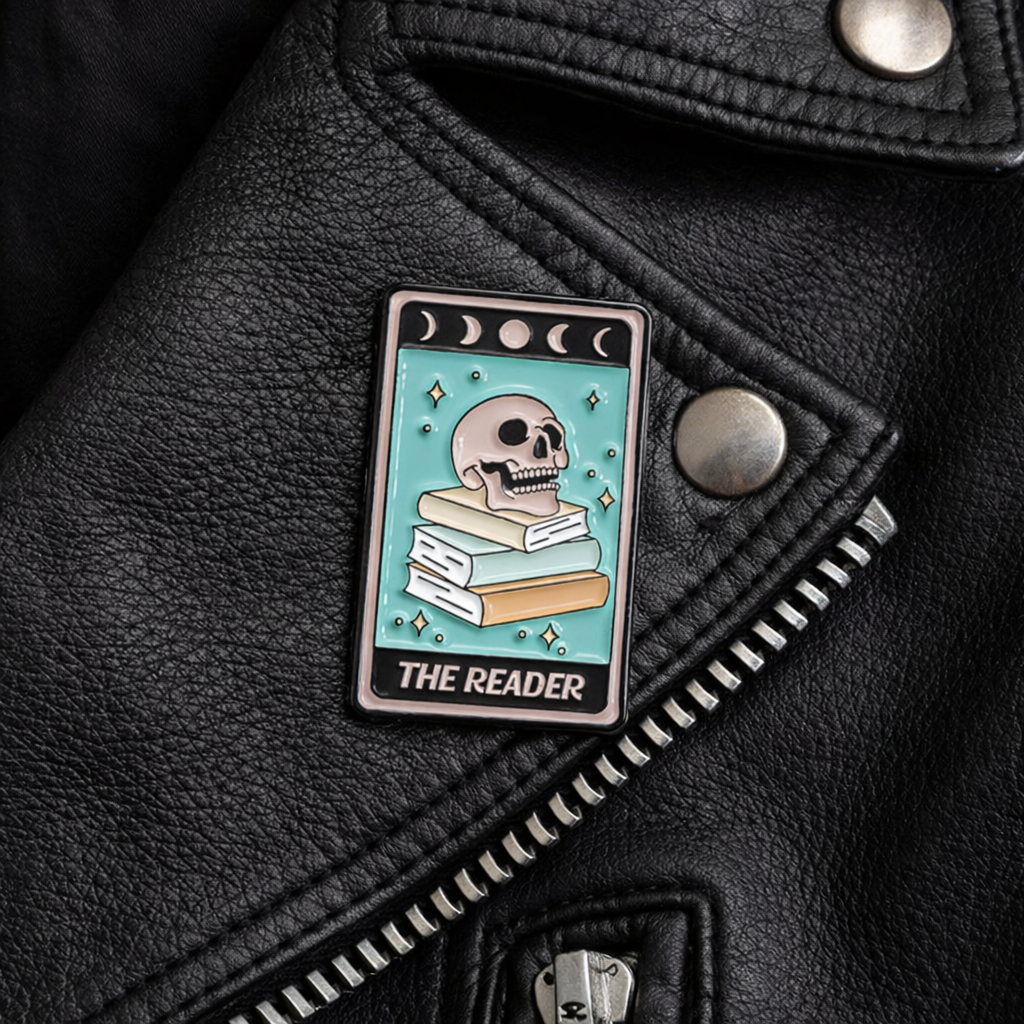 THE READER LAPEL PIN