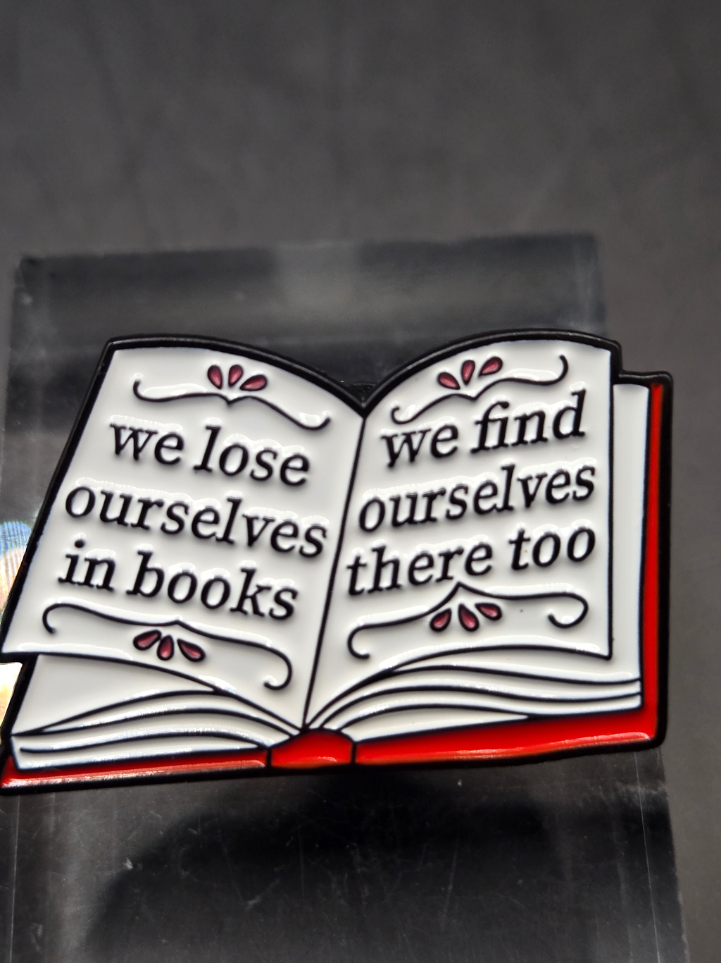 We Lose Ourselves In Books Pin